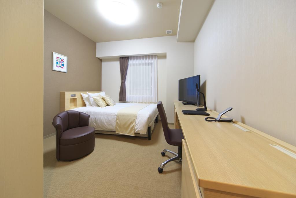 Shizutetsu Hotel Prezio Numazu Rum bild